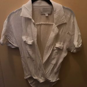 White v neck top with breast pockets